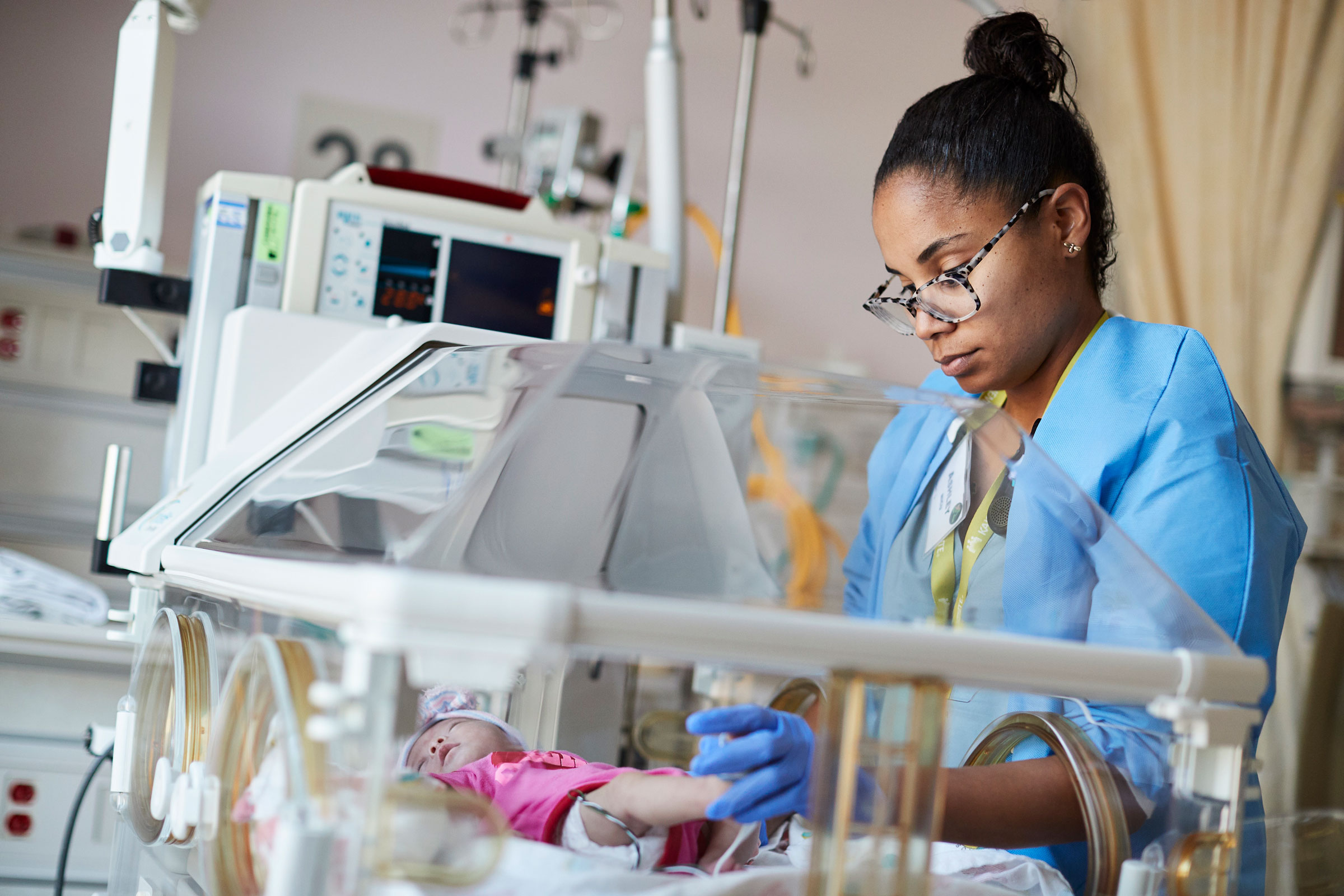 NICU nurse with baby NICU nurse with baby